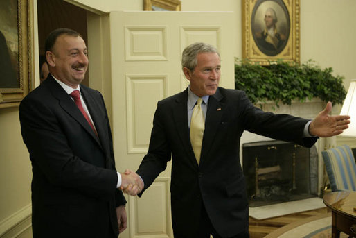President George W. Bush welcomes President Ilham Aliyev of Azerbaijan to the Oval Office Friday, April 28, 2006. White House photo by Paul Morse.